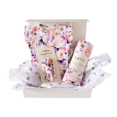 Snuggle Hunny Classic Blushing Beauty gift hamper in a cream gift box with organic frill bodysuit, topknot and print muslin wrap