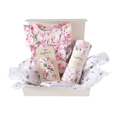 Snuggle Hunny Classic Cherry Blossom gift hamper in a cream gift box with organic bodysuit, topknot and Cherry Blossom print muslin wrap