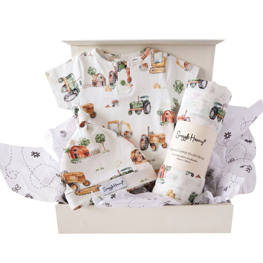 Snuggle Hunny Classic Diggers & Tractors gift hamper in a cream gift box with organic bodysuit, knotted beanie and print muslin wrap