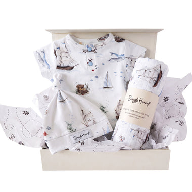 Snuggle Hunny Classic Set Sail gift hamper in a cream gift box with organic bodysuit, knotted beanie and print muslin wrap