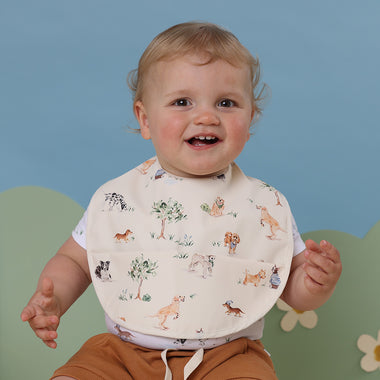 Toddler wearing Dog Park Snuggle Bib | Snuggle Hunny