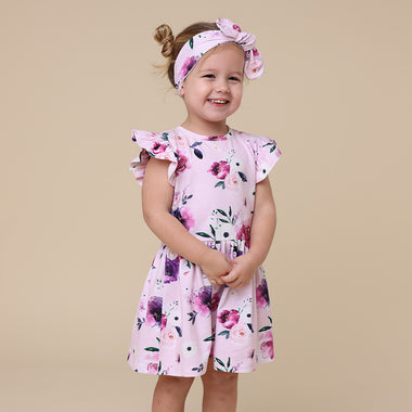 Toddler wearing Floral Kiss Short Sleeve Organic Dress | Snuggle Hunny