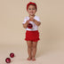 Toddler wearing Red Organic Bloomers | Snuggle Hunny